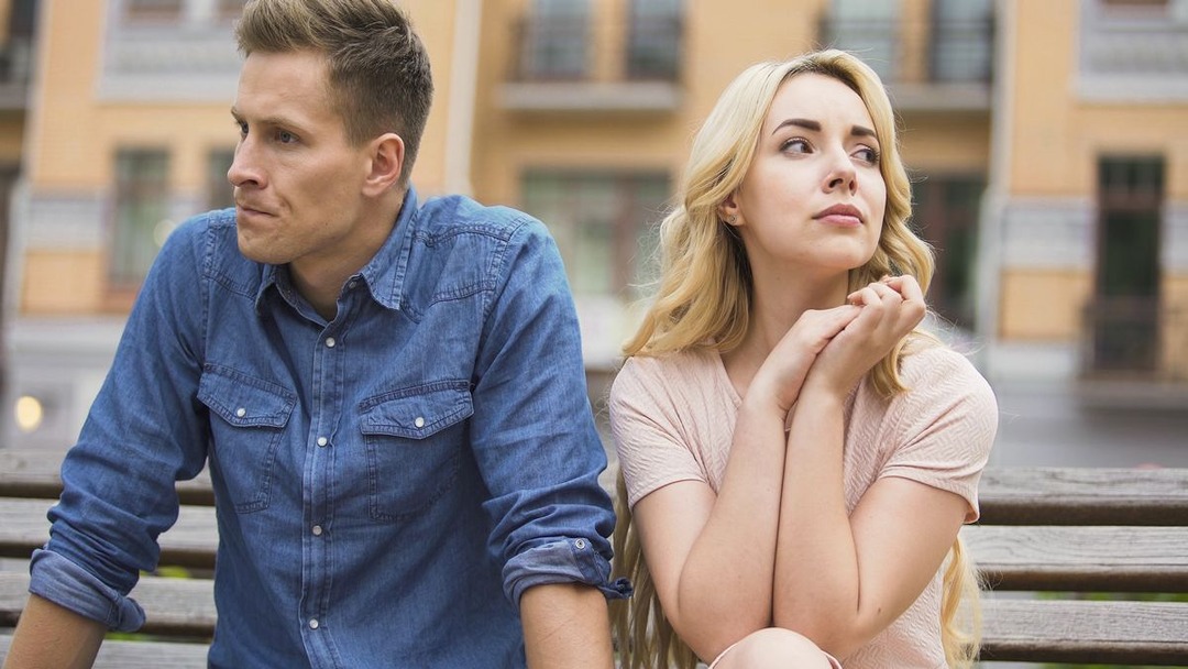 unhappy_couple_sitting_on_a_bench_-_divorce_lawyer_in_gulf_breeze_-_lacie_bowden_law.jpg