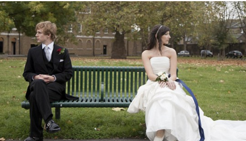 groom_and_bride_on_bench_unhappy-divorce_attorney_gulf_breeze-_lacie_bowden_law_67_bay_bridge_dr_gulf_breeze__fl_32561.png