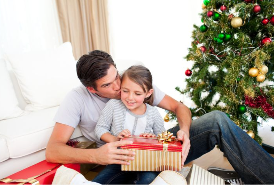man_with_daughter_at_christmas-lacie_bowden_law.png