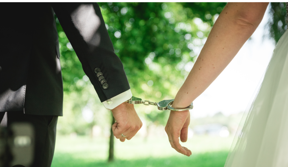 handcuffed_wedding_couple-_lacie_bowden_law-divorce_attorney_in_gulf_breeze.png